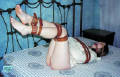 Dorothy in bedroom straitjacket